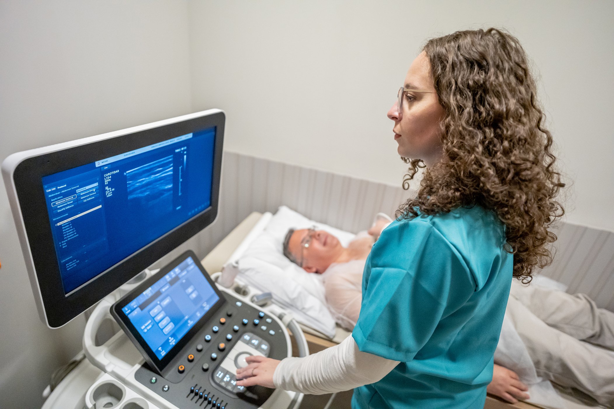 Mature man taking an echocardiogram